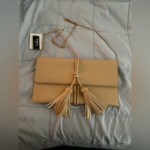 Tan Clutch with Tassel Accents